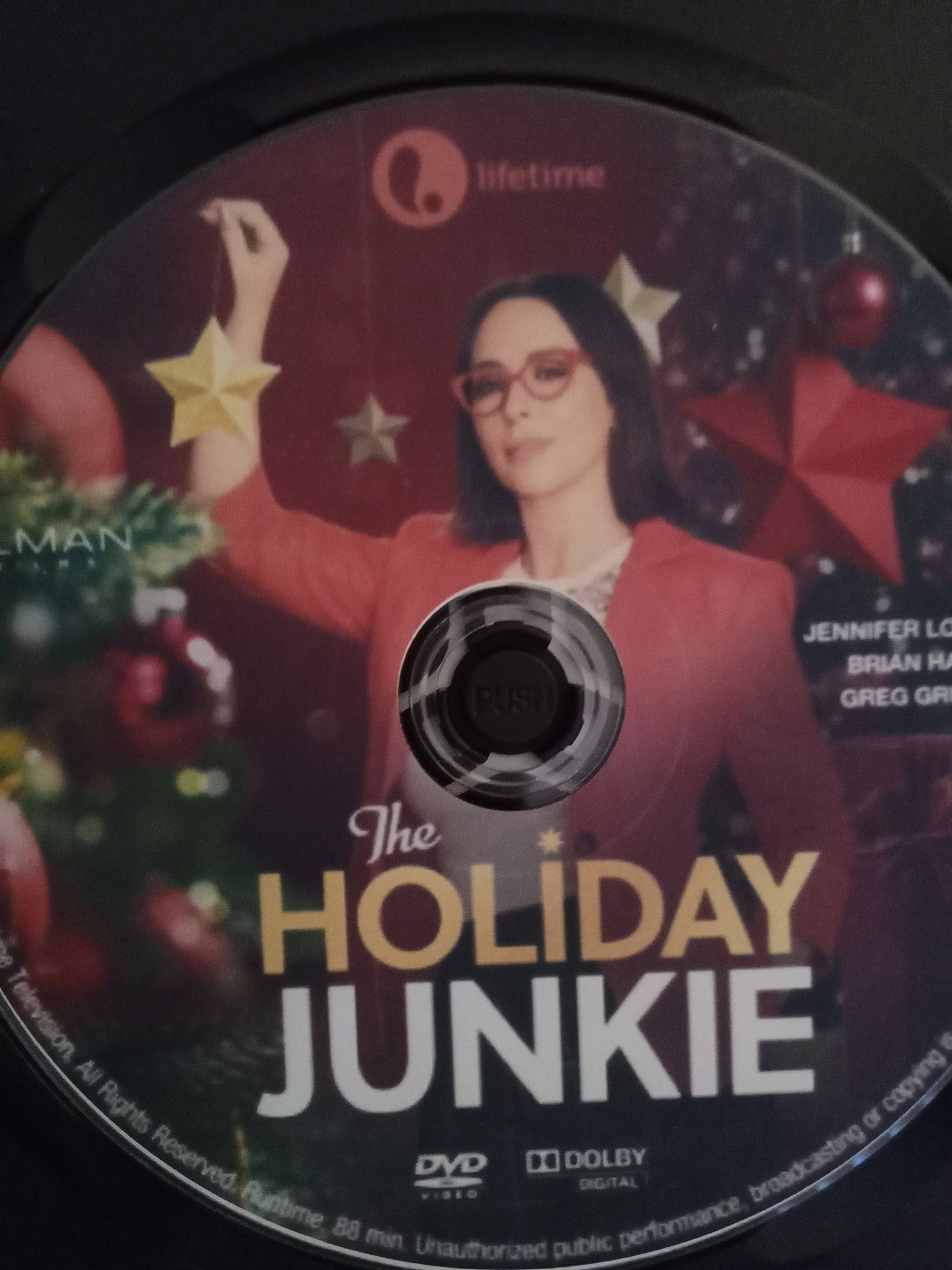 Holiday Junkie (2024) DVD with Jennifer Love Hewitt in a DVD case with artwork